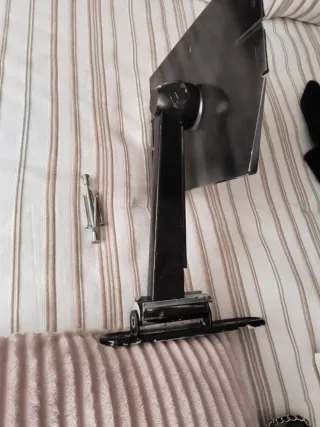 Soporte pared TV metal negro.31cm el brazo