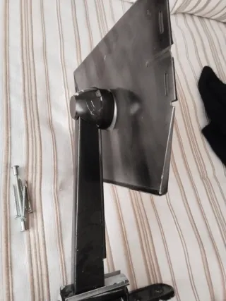 Soporte pared TV metal negro.31cm el brazo