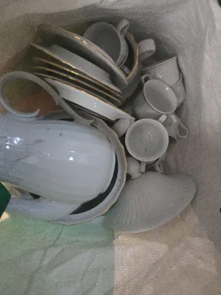 Juego de tazas y platos de porcelana