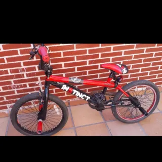 Bicicleta BMX Instinct Roja Regalo casco para niño