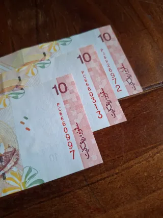 Lotto 3 banconote 10 MYR fior di conio