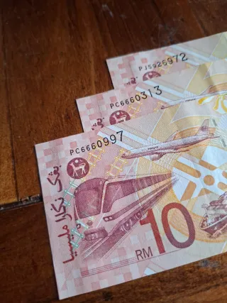 Lotto 3 banconote 10 MYR fior di conio