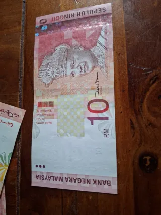 Lotto 3 banconote 10 MYR fior di conio