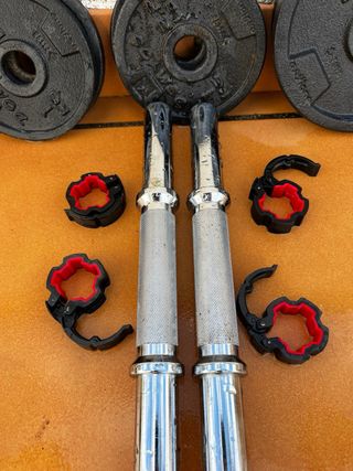 Kit mancuernas con 2 barras y 12 pesos