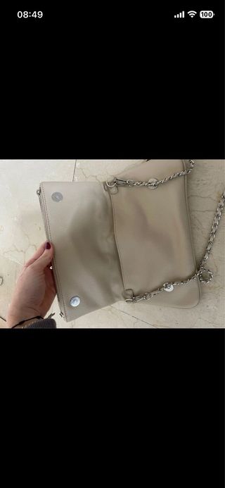 Bolso beige con alas