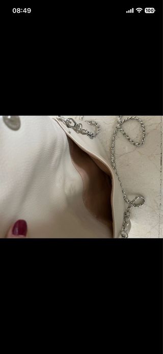 Bolso beige con alas