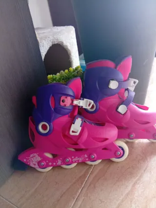 Patines Oxelo niña rosas y morados