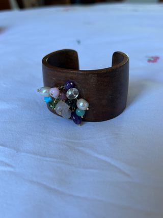 Pulsera Esclava Tous de oro 1ª ley,  nogal y gemas