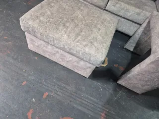 Sofá modular gris tela con otomana