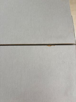 Mesa extensible cristal y metal con 2 sillas