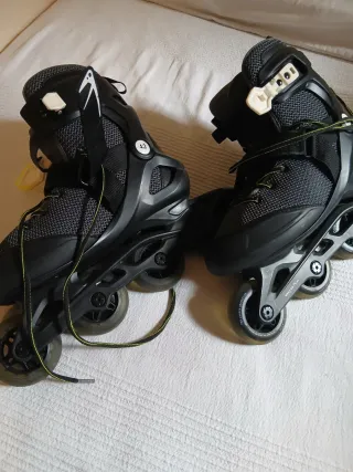 Patines Oxelo Talla 42 como nuevos y protecciones