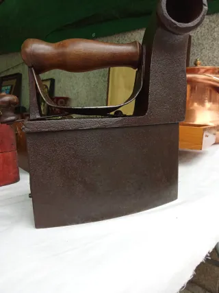 Plancha de carbón antigua