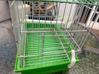 Jaula para canario verde y blanca