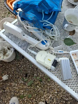 Plancha antigua y depiladora Braun Silk-épil