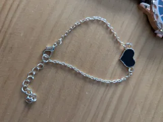 Reloj y pulsera negro y dorado