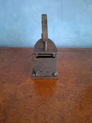 Plancha de carbón antigua