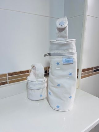 Porta biberones y chupetes estrellas