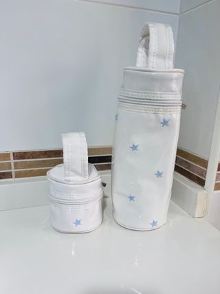 Porta biberones y chupetes estrellas