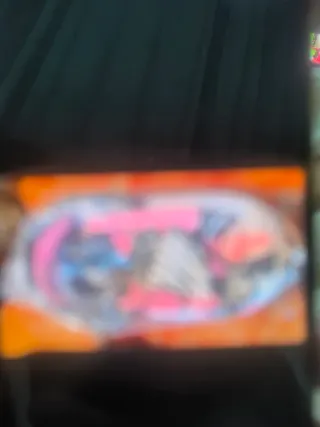 Cochecito de bebé rosa con estampado cebra