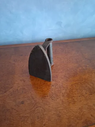 Plancha antigua de hierro fundido