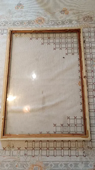 Marco de fotos dorado con cristal