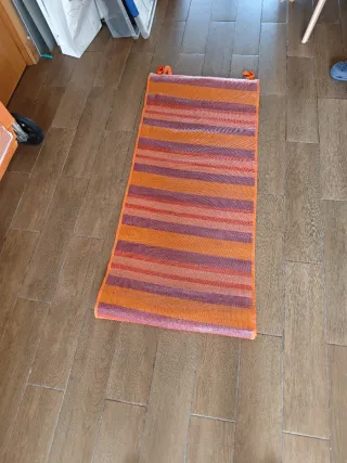 Silla de playa naranja con ruedas + esterilla.