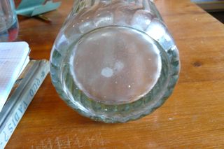 Sifón antiguo con cabeza de plomo