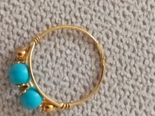 Anello oro con 2 turchesi