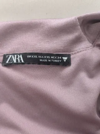 Vestido Zara lila empolvado, en punto de seda.