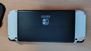 Nintendo Switch OLED Bianca + Controller Pro Tom Nook