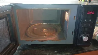 Microondas 23L Negro marca carrefour. Funciona ok