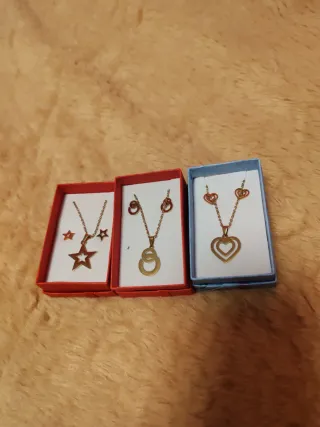 Conjuntos Acero Dorado