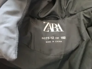 Cazadora negra niña invierno