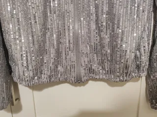 Chaqueta bomber lentejuelas plateada