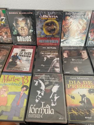 Lote dvd 13 “  precintados varios géneros”