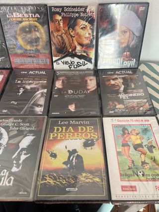 Lote dvd 13 “  precintados varios géneros”