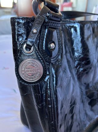 Bolso de TOUS en piel de color negro