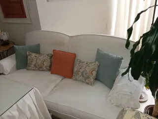 Sofás y sillón orejero de tela