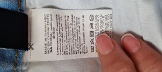 Falda midi vaquera con bolsillos