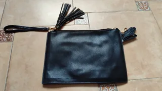 Bolsos de mano con estrellas y serpiente