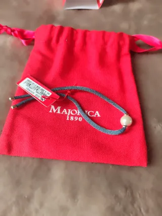 Pulsera Majorica perla ,con detalles plata.