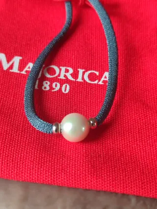 Pulsera Majorica perla ,con detalles plata.