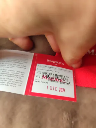 Pulsera Majorica perla ,con detalles plata.