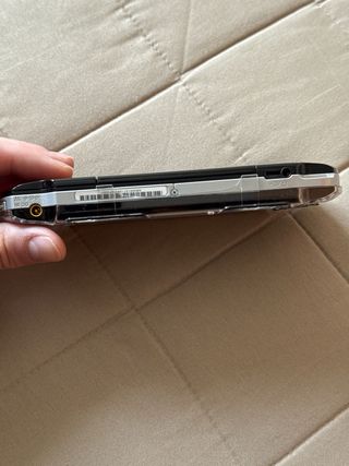 PSP 3000 Negra y 8 juegos