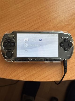 PSP 3000 Negra y 8 juegos