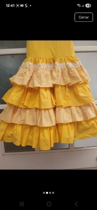 Vestido de flamenca amarillo las tallas esta en.la