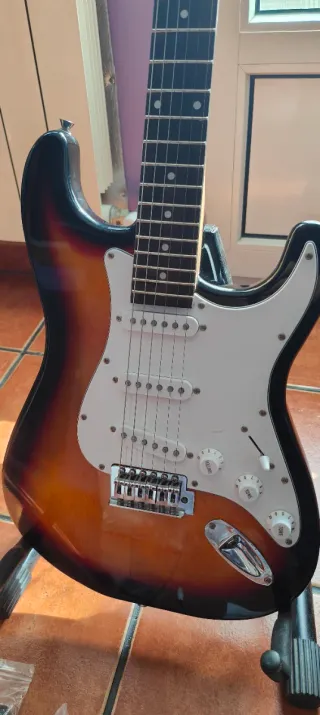 Guitarra eléctrica, amplificador y accesorios