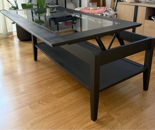Mesa de centro negra con tapa de cristal