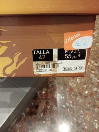 Botas de vestir negras y marrones