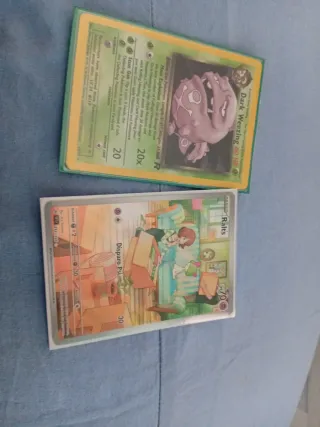 Carta Pokémon Ralts 211/190 y Dark Weezing